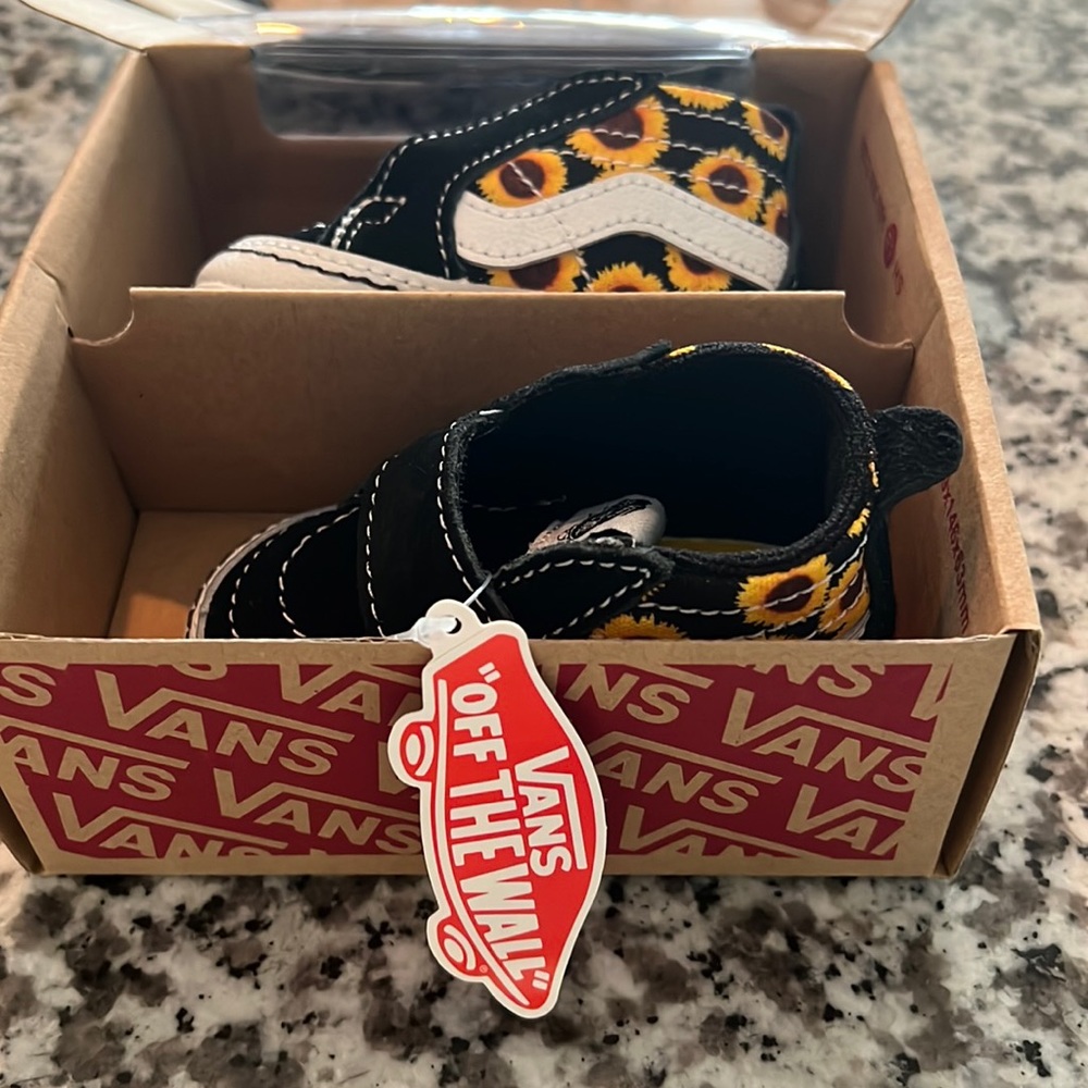 Vans baby size 2 sunflower shoes. Brand new with tags in box.